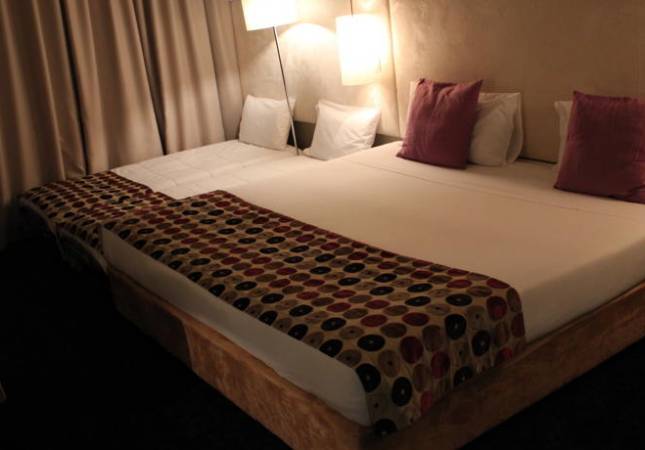 Espaciosas habitaciones en Douro Palace Hotel Resort & Spa. Disfrúta con nuestro Spa y Masaje en 