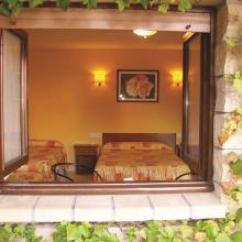 Románticas habitaciones en Hotel la Ruta de Cabrales. Disfruta  nuestra oferta en Asturias
