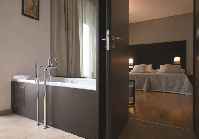 Confortables habitaciones en Hotel & Boutique Spa Adealba. Relájate con los mejores precios de Badajoz