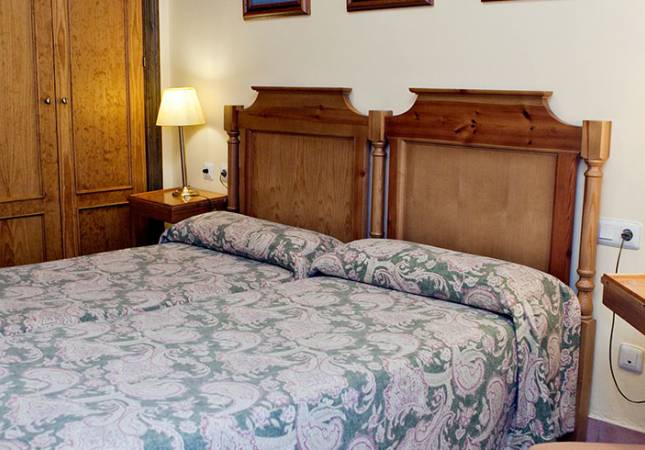 Espaciosas habitaciones en Apartahotel Trevenque. El entorno más romántico con nuestro Spa y Masaje en Granada