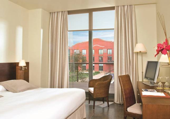 Espaciosas habitaciones en Hotel Barcelona Golf & Resort. Relájate con nuestro Spa y Masaje en Barcelona
