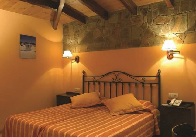 Espaciosas habitaciones en Hotel Ripoll. Disfrúta con nuestro Spa y Masaje en Girona