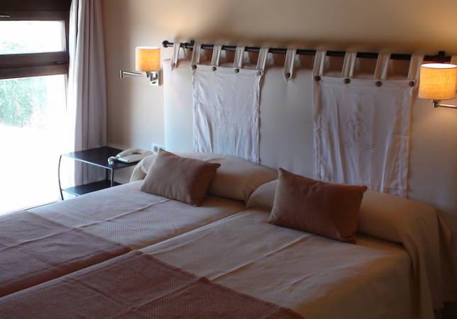 Espaciosas habitaciones en Hospedería Monasterio de Ntra Sra de Rueda. Disfrúta con nuestro Spa y Masaje en Zaragoza