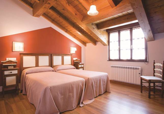 Espaciosas habitaciones en Apartamentos la Fonda de Bustio. Disfruta  nuestro Spa y Masaje en Asturias